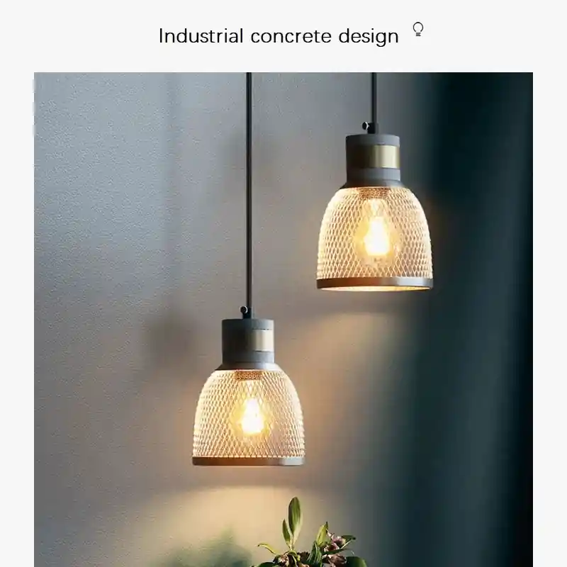 Lampe suspendue en béton industriel et abat-jour en fer.