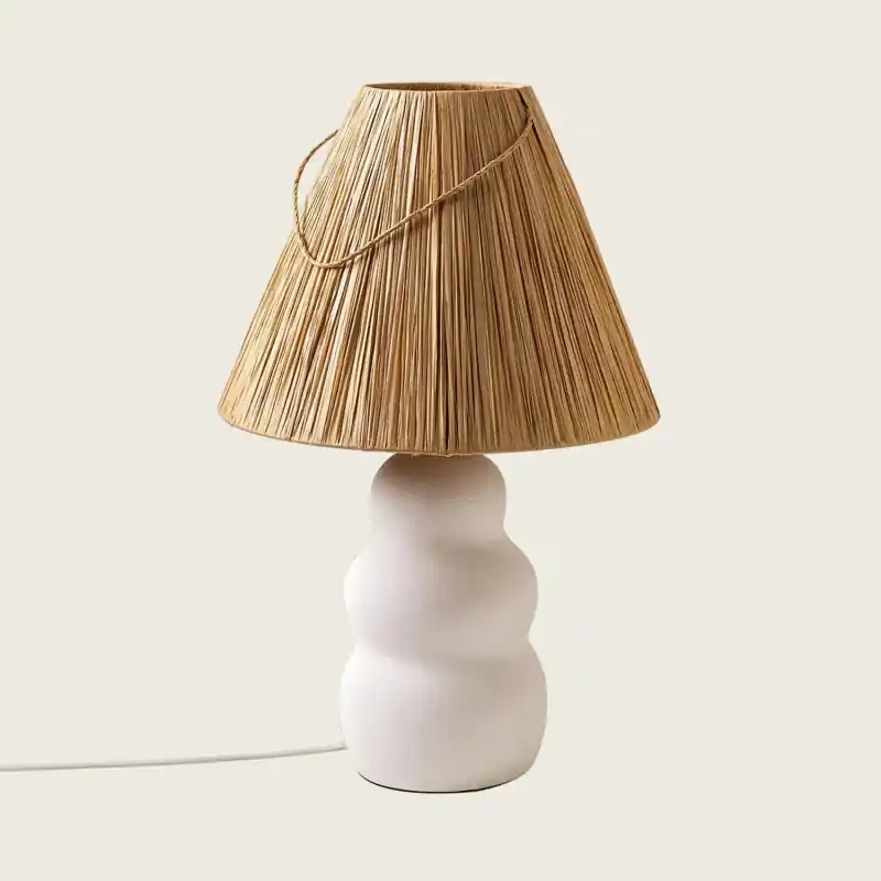 Lampe a poser céramique blanche et abat jour rafia