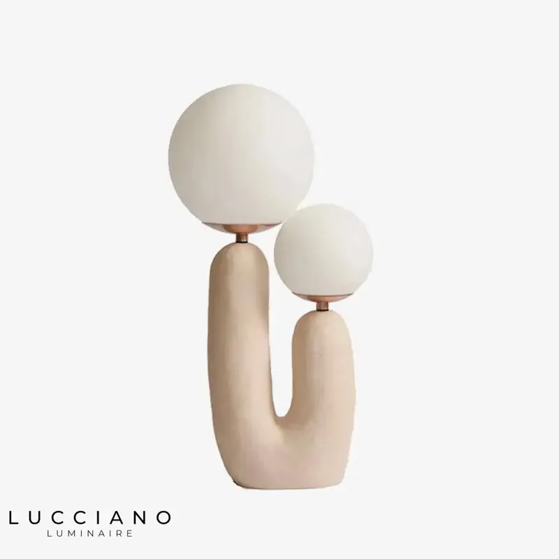 Lampe LED design résine rose.