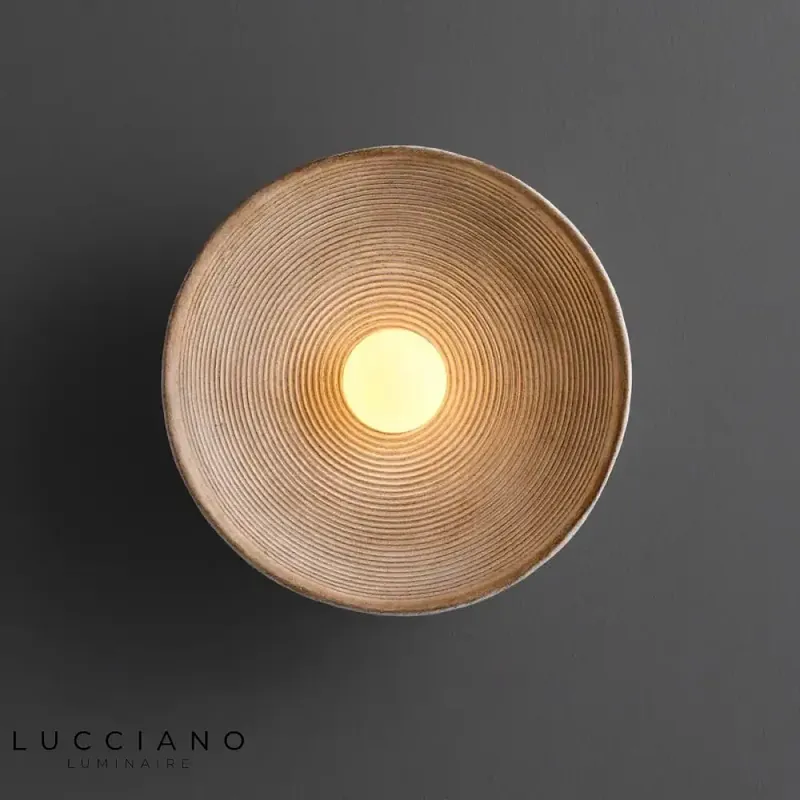 Applique murale LED ronde, élégance vintage épurée.